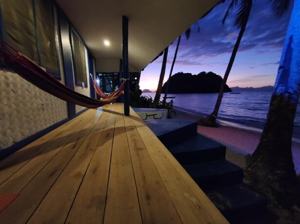 Imagen de la habitación del Hotel El Nido Beach Huts. Foto 4