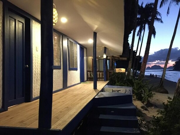 Imagen de la habitación del Hotel El Nido Beach Huts. Foto 6