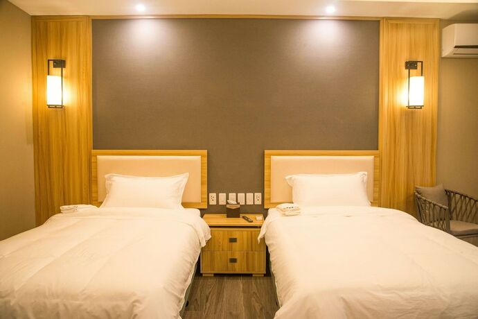 Imagen de la habitación del Hotel El Nido Garden Resort. Foto 12