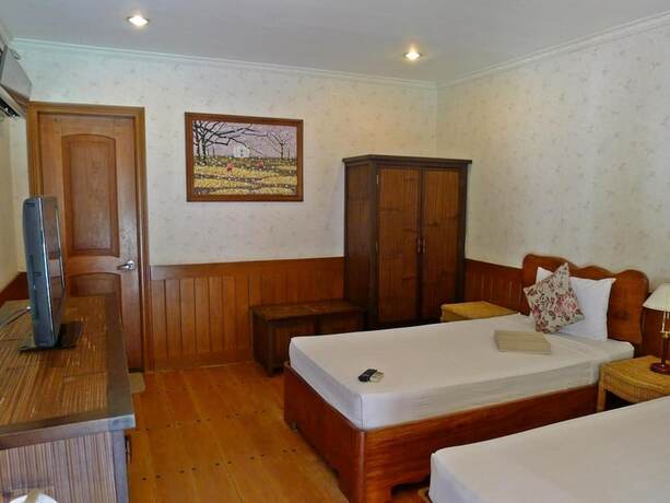 Imagen de la habitación del Hotel El Nido Garden Resort. Foto 13