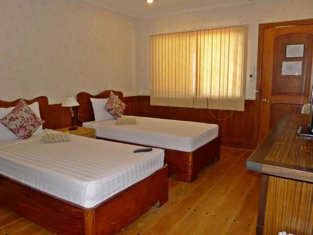 Imagen de la habitación del Hotel El Nido Garden Resort. Foto 17