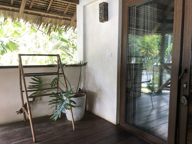 Imagen de la habitación del Hotel El Nido Mahogany Beach. Foto 24