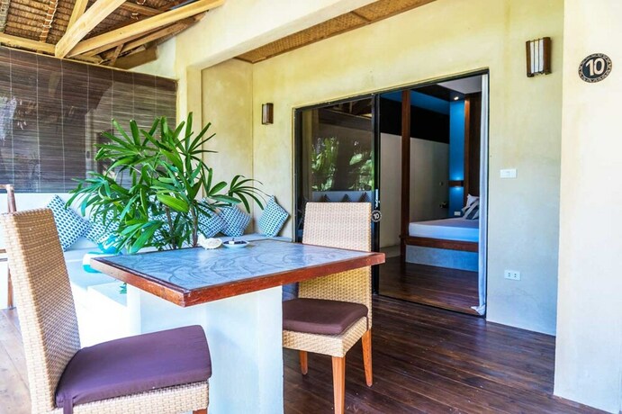 Imagen de la habitación del Hotel El Nido Mahogany Beach. Foto 30