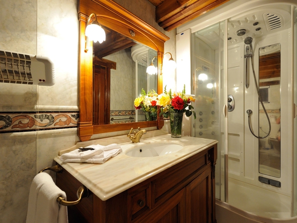 Imagen de la habitación del Hotel El Nogal Boutique y Spa. Foto 7