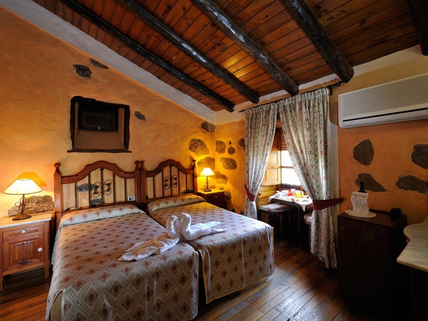 Imagen de la habitación del Hotel El Nogal Boutique y Spa. Foto 10