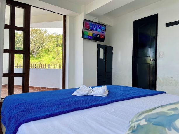 Imagen de la habitación del Hotel El Olimpo. Foto 4