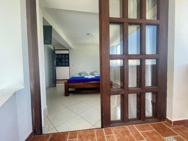 Imagen de la habitación del Hotel El Olimpo. Foto 6