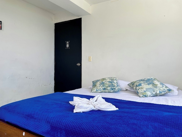 Imagen de la habitación del Hotel El Olimpo. Foto 13