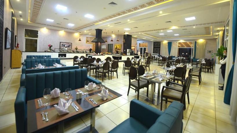 Imagen del bar/restaurante del Hotel El Olivar Palace Marrakech. Foto 2