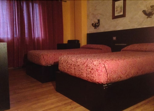 Imagen de la habitación del Hotel El Palacio. Foto 8