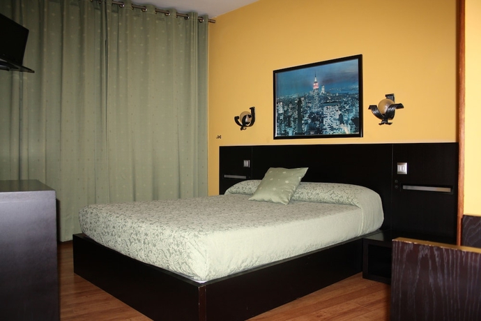 Imagen de la habitación del Hotel El Palacio. Foto 14