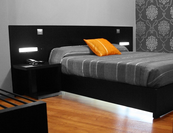 Imagen de la habitación del Hotel El Palacio. Foto 15