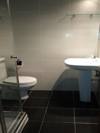 Imagen de la habitación del Hotel El Palacio. Foto 17