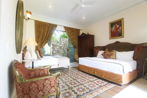 Imagen de la habitación del Hotel El Palacito Secreto Luxury Boutique Hotel & Spa. Foto 12