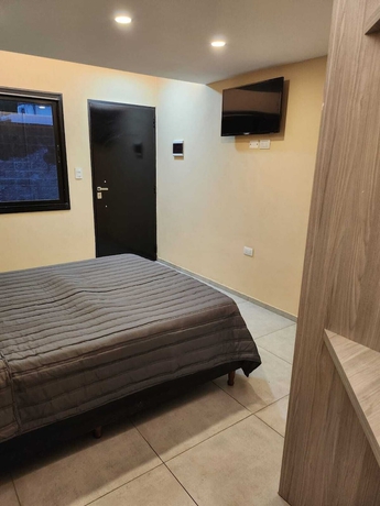 Imagen de la habitación del Hotel El Paraiso Boutique. Foto 12