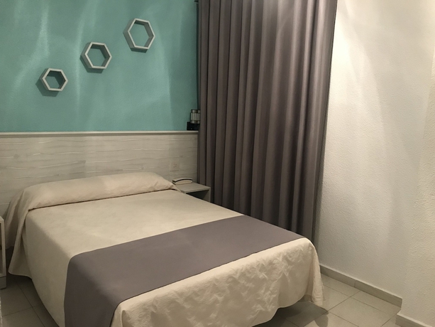 Imagen de la habitación del Hotel El Paraiso. Foto 9