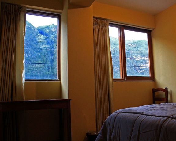 Imagen de la habitación del Hotel El Parche Rutero. Foto 13