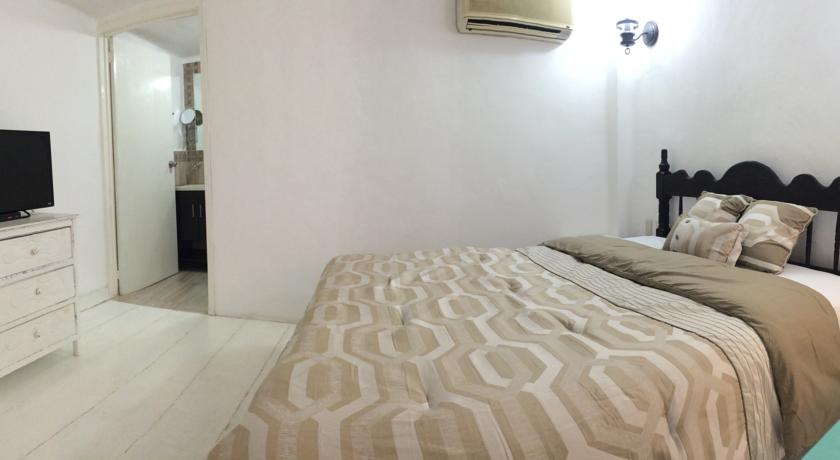 Imagen de la habitación del Hotel El Patio & Suites. Foto 4