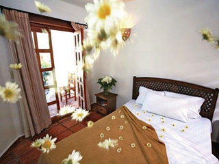 Imagen de la habitación del Hotel El Patio & Suites. Foto 5