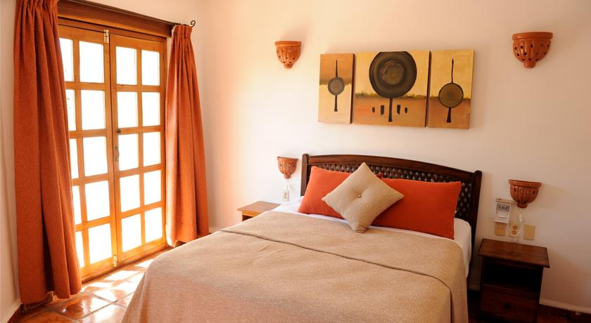 Imagen de la habitación del Hotel El Patio & Suites. Foto 6