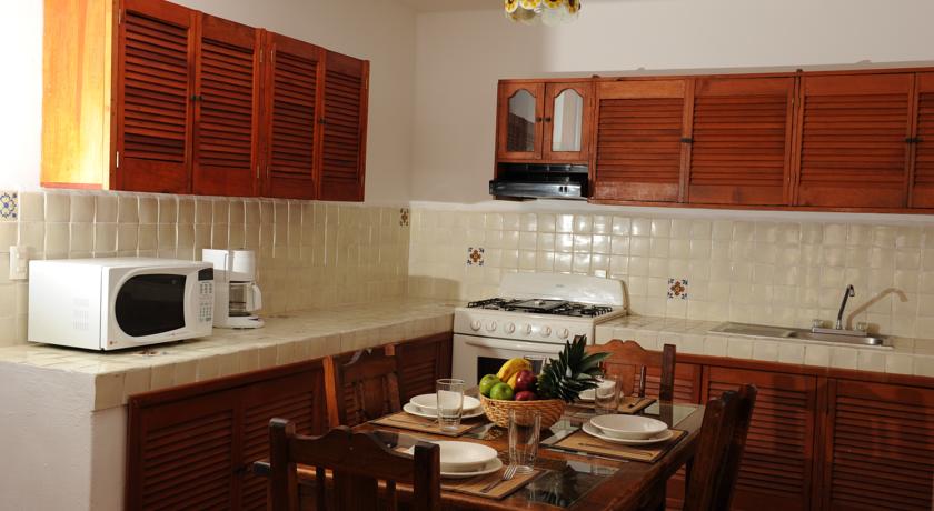 Imagen de la habitación del Hotel El Patio & Suites. Foto 9