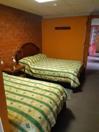 Imagen de la habitación del Hotel El Pedron. Foto 11