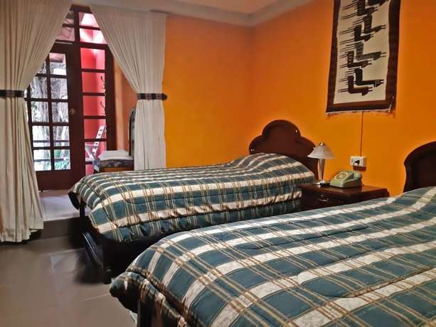 Imagen de la habitación del Hotel El Pedron. Foto 16