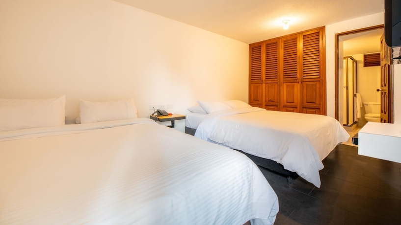 Imagen de la habitación del Hotel El Peñon. Foto 15