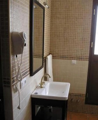 Imagen de la habitación del Hotel El Perro de Paterna. Foto 4