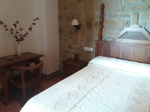Imagen de la habitación del Hotel El Perro de Paterna. Foto 8