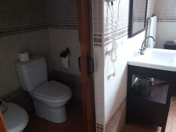 Imagen de la habitación del Hotel El Perro de Paterna. Foto 14