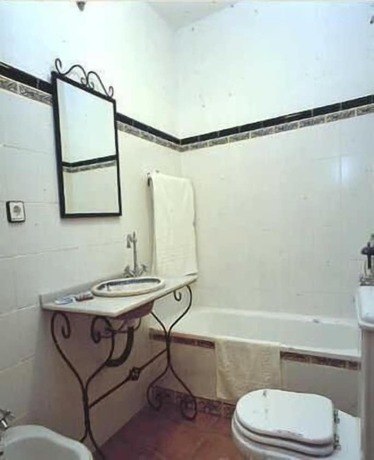 Imagen de la habitación del Hotel El Perro de Paterna. Foto 18