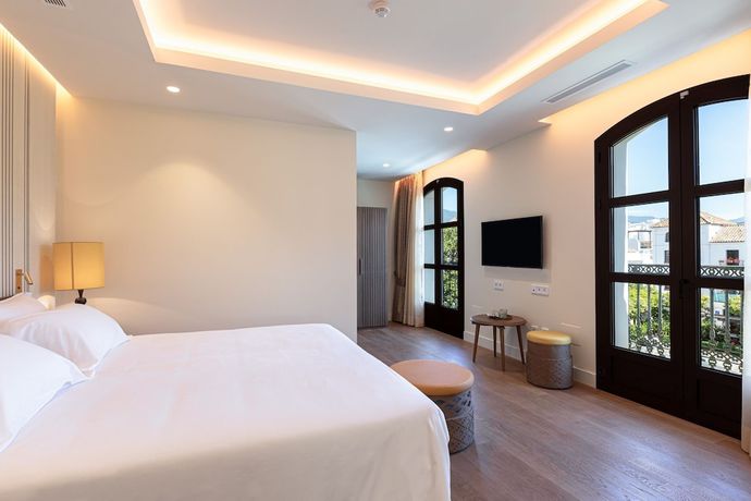 Imagen de la habitación del Hotel El Pilar Andalucia. Foto 11