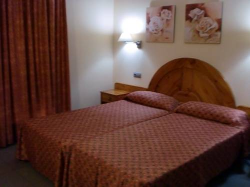 Imagen de la habitación del Hotel El Pinche de Oro. Foto 2