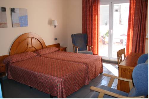 Imagen de la habitación del Hotel El Pinche de Oro. Foto 5