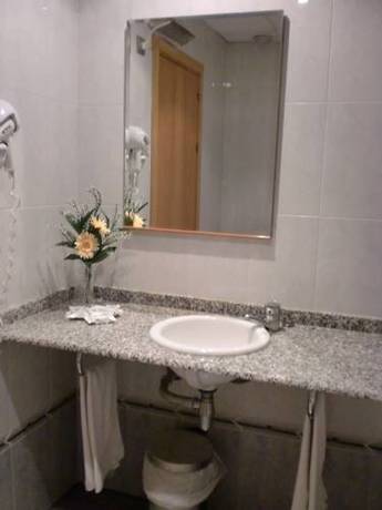 Imagen de la habitación del Hotel El Pinche de Oro. Foto 9