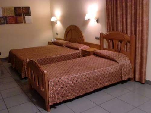 Imagen de la habitación del Hotel El Pinche de Oro. Foto 11