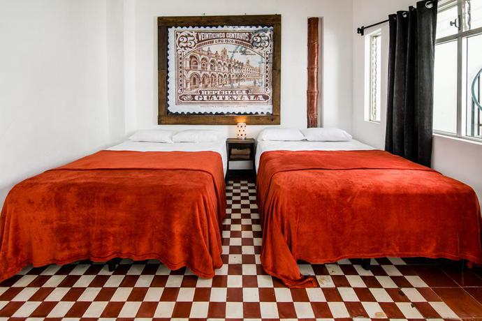 Imagen de la habitación del Hotel El Poeta BnB. Foto 9