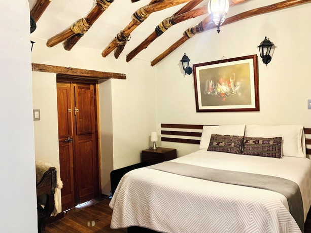 Imagen de la habitación del Hotel El Portal de Qopuy Lodge. Foto 4