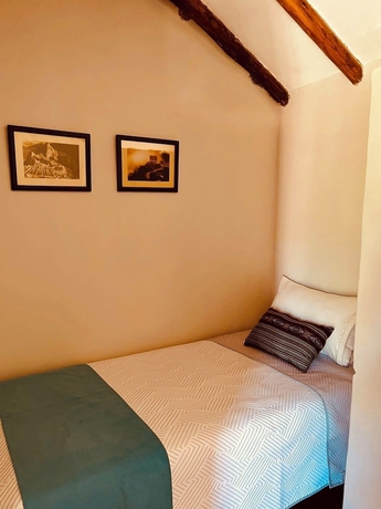 Imagen de la habitación del Hotel El Portal de Qopuy Lodge. Foto 7