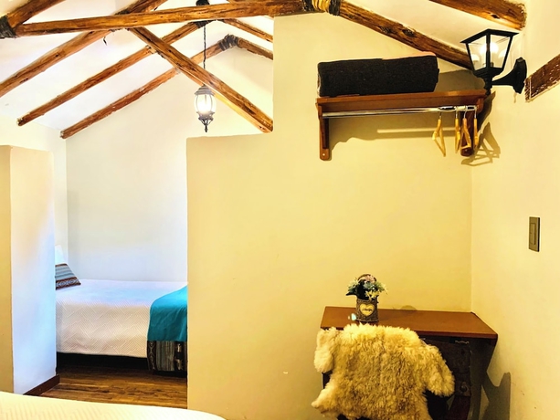 Imagen de la habitación del Hotel El Portal de Qopuy Lodge. Foto 10