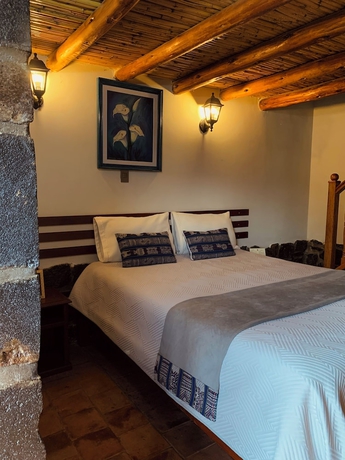 Imagen de la habitación del Hotel El Portal de Qopuy Lodge. Foto 12