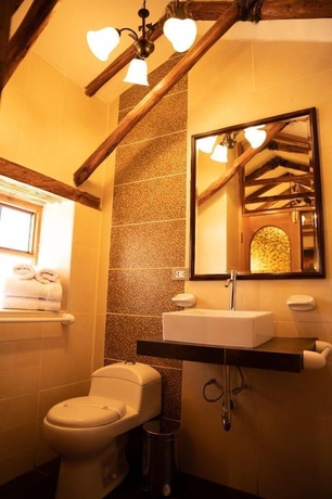 Imagen de la habitación del Hotel El Portal de Qopuy Lodge. Foto 14