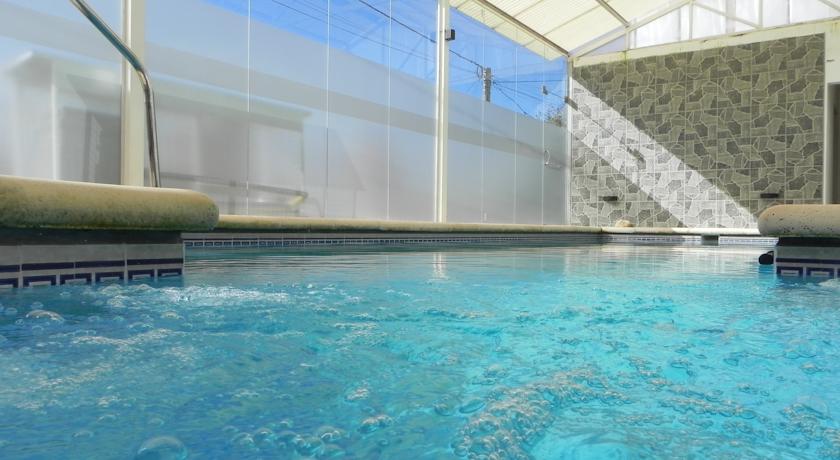 Imagen de la piscina del Hotel El Portal de la Villa Hotel. Foto 12