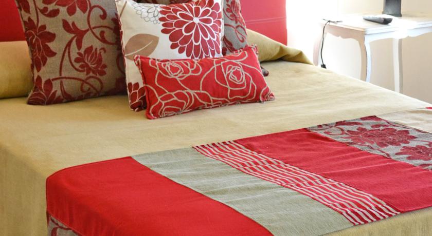 Imagen de la habitación del Hotel El Portal de la Villa Hotel. Foto 6