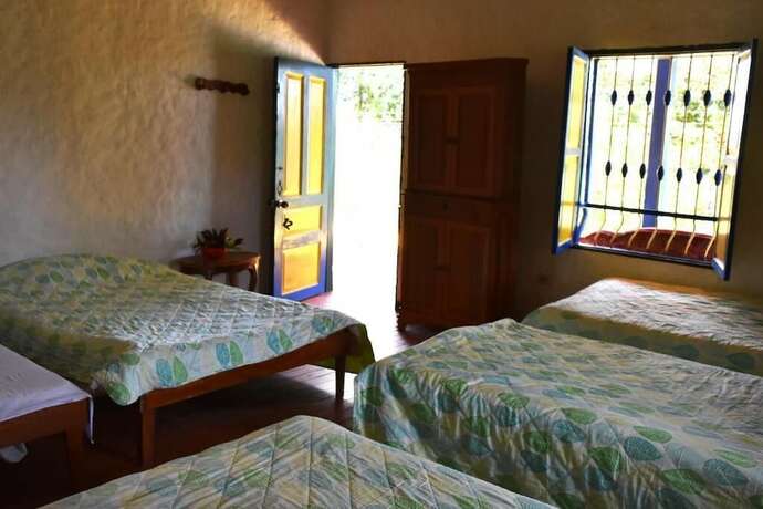 Imagen de la habitación del Hotel El Prado EcoHotel. Foto 15