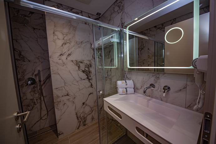 Imagen de la habitación del Hotel El Primero Hotel. Foto 9