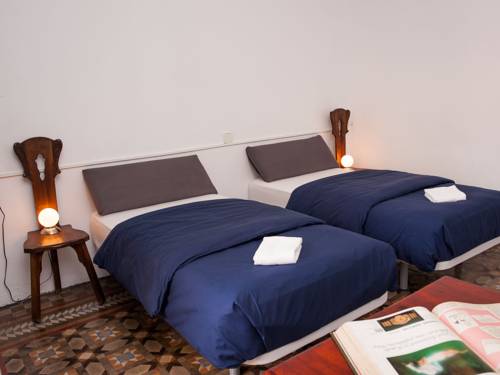 Imagen de la habitación del Hotel El Puchi Barcelona. Foto 4