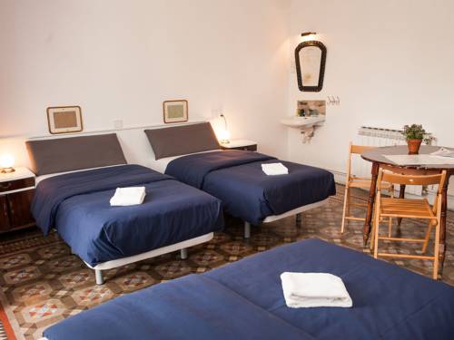 Imagen de la habitación del Hotel El Puchi Barcelona. Foto 7