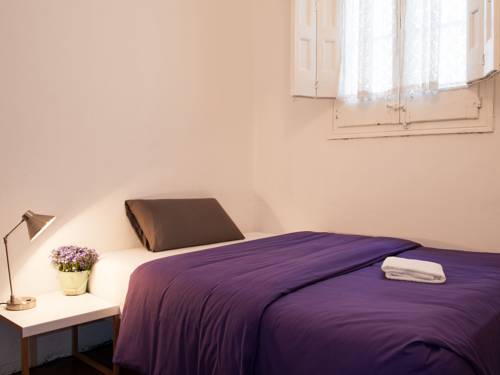 Imagen de la habitación del Hotel El Puchi Barcelona. Foto 9